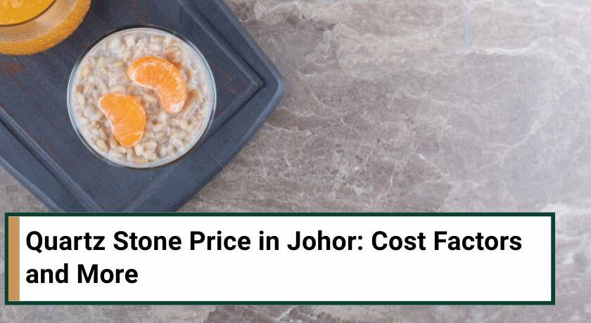 Porridge with two orange slices in a glass on a wooden tray, next to orange juice, on a quartz stone countertop.